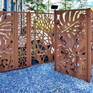 Decorative metal garden fence with intricate designs.
