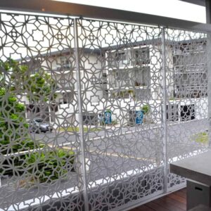 Decorative panel with geometric pattern on balcony.